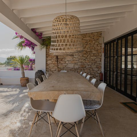 Gather for meals at the large alfresco dining table