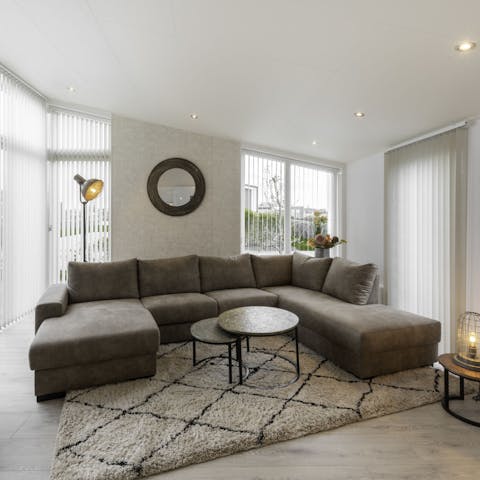 Put your feet up on the plush corner sofa at the end of the day