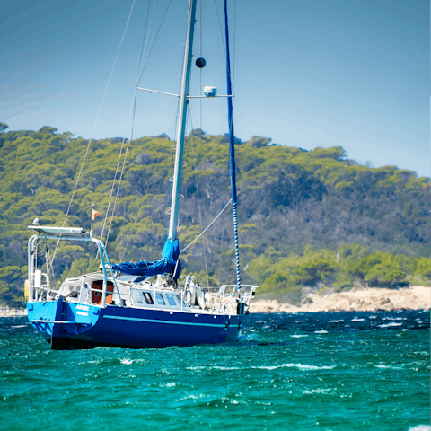 Spend your day exploring the island's bays by boat