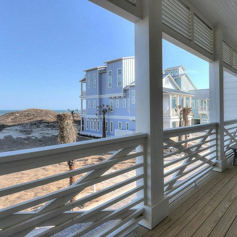 Watch the waves from the balcony overlooking the water of Port Aransas