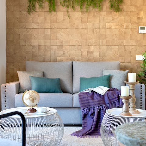 Curl up under the throw after a busy day spent exploring the city