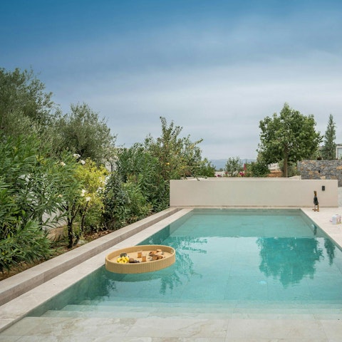 Cool off in the private pool and relax amid the greenery