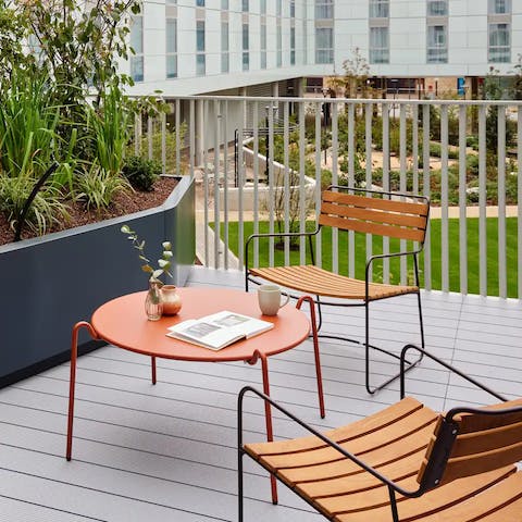 Chill out on the private terrace with a glass of wine and a courtyard view