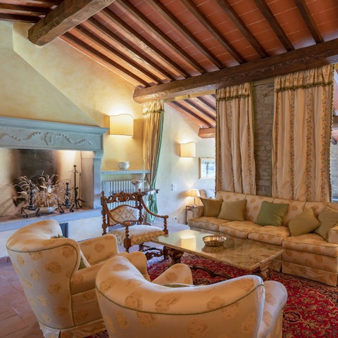 Settle down besides the fireplace in one of several majestic sitting rooms