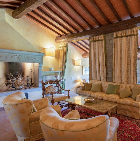 Settle down besides the fireplace in one of several majestic sitting rooms