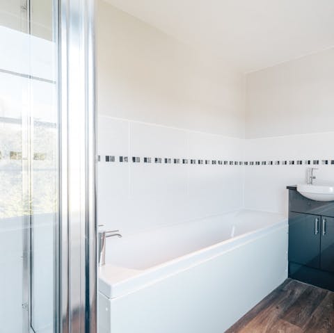 Finish the day with a restorative soak in the pristine bathtub