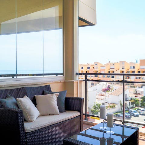 Put your feet up and savour the good weather from your balcony