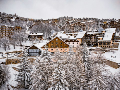 Wander the stone-and-timber streets of a classic Savoyard alpine village