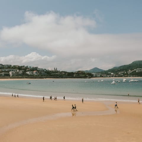 Stroll the short distance to La Concha beach and sink your feet into the sand