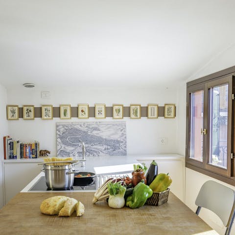 Cook up some Venetian bigoli in salsa in the cosy kitchen