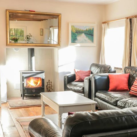 Cosy up in front of the fireplace after a long day in the fresh air