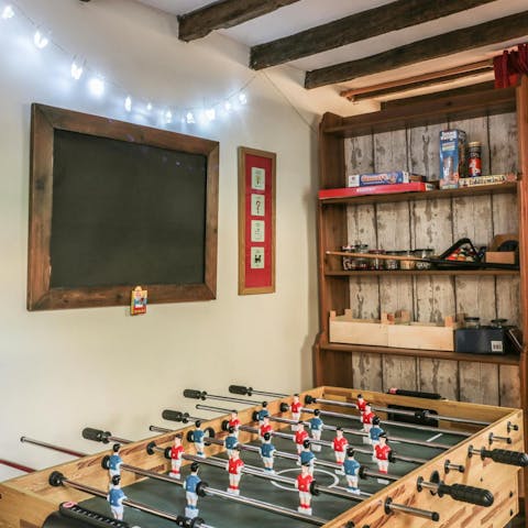 Get competitive with a round of table football in the games room