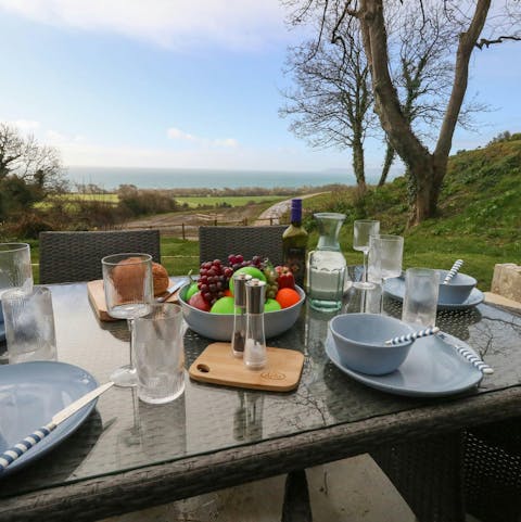 Take in the stunning views over the bay from the south-facing terrace