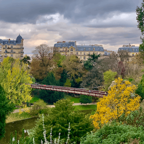 Take a fresh air stroll around Parc des Buttes Chaumont, a short walk away