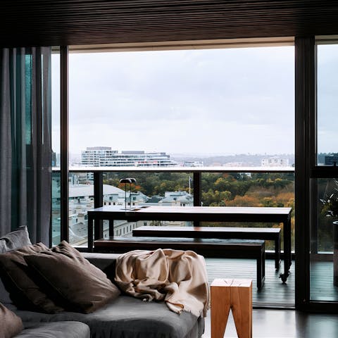 Have your morning coffee on the balcony overlooking Treasury Gardens
