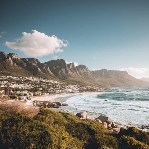Wander down to Capes Bay Beach and dip your toes in the Atlantic Ocean