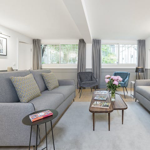 Check out the host's selection of coffee-table books as you relax on the plush sofa