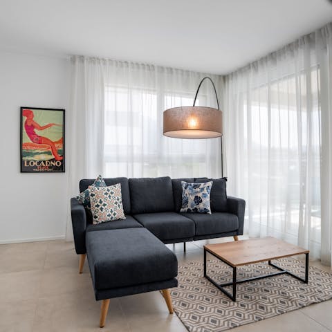 Get comfy on the sofa after a busy day of exploring the Swiss Alps