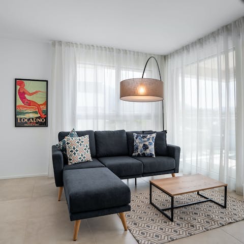 Get comfy on the sofa after a busy day of exploring the Swiss Alps