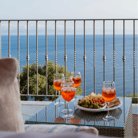 Sip an Aperol Spritz while admiring the sea views