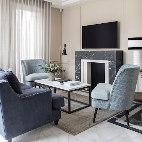 Get comfy in the elegant living room and enjoy and evening of movies