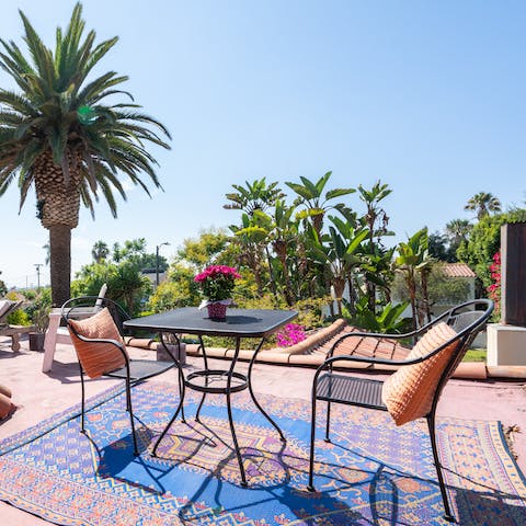 Dine with the palm trees as your backdrop