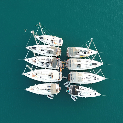 Drive nine-minutes to Porto Heli and hire a yacht