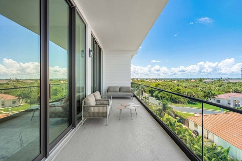 Pour a glass of wine and relax on the balcony