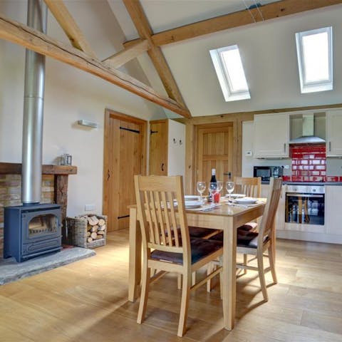 Warm up by the wood burning stove at dinner time