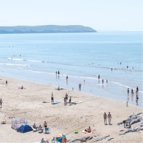 Build sandcastles at Camber Sands, a twenty-minute drive away