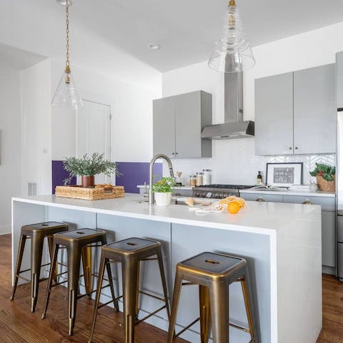 Take your morning coffee at the stylish breakfast bar