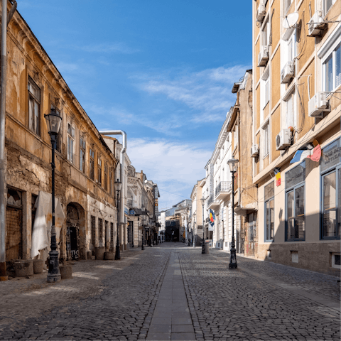 Explore the cobbled streets of Bucharest's old town, a stone's throw from home