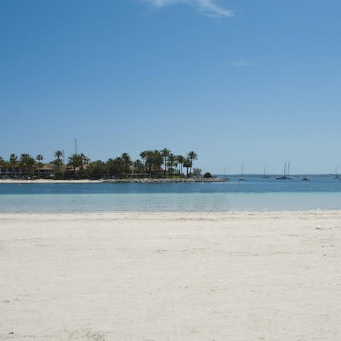 Walk to the nearest beach at Platja d'Alcúdia in five minutes