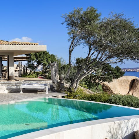 Take a dip in the pool and enjoy a scenic swim surrounded by breathtaking views