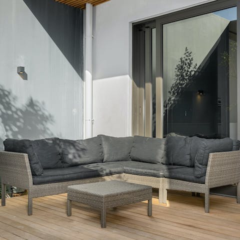 Relax in the private courtyard with a glass of South African wine