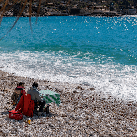 Spend sunny afternoons at the cute pebble beach, just a short drive away