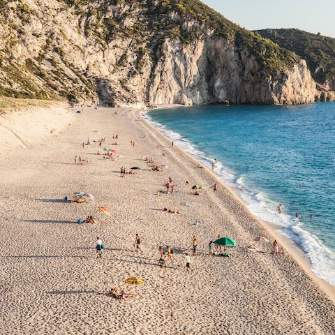 Spend leisurely days on the organised beach in Naxos, a fifteen-minute drive away