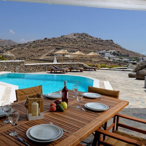 Enjoy a fresh spread of local produce on the outdoor dining table
