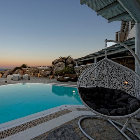 Spend your evenings poolside in the stylish egg chair