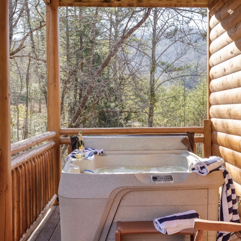 Pour yourself a glass of champagne and indulge in pure relaxation in the hot tub