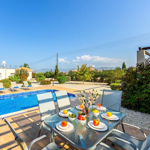 Enjoy breakfast alfresco with a view of the mountains on the horizon