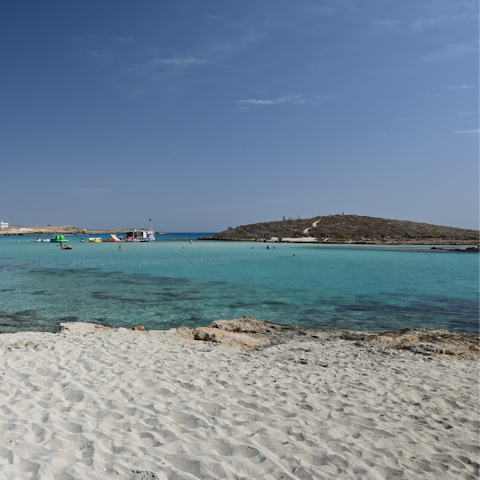 Spend the day on Latsi Beach, minutes away by car
