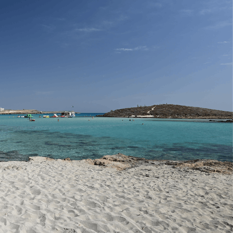 Spend the day on Latsi Beach, minutes away by car