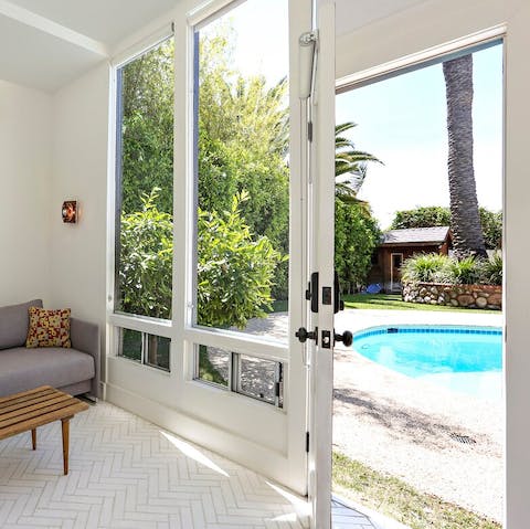 Enjoy the natural light streaming in through the large glass doors