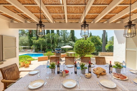 Gather under the pergola for long lunches poolside