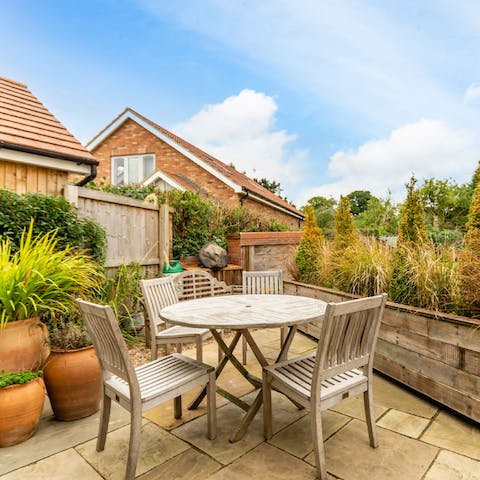 Enjoy a light lunch or hearty Sunday roast on the sun trap patio