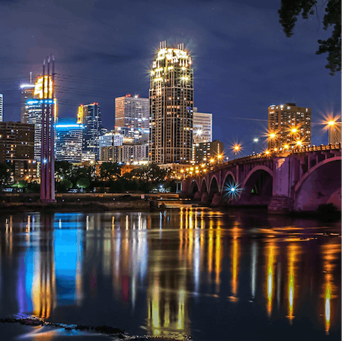 Explore Downtown Minneapolis, a twenty-minute walk or a five-minute drive from this home