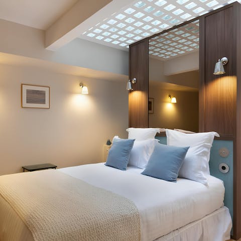 Slip into a deep slumber in the serene bedroom