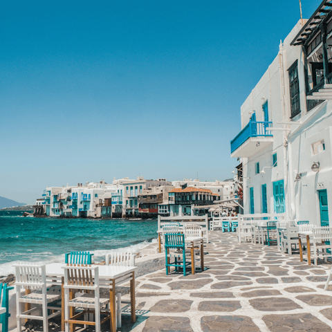 Explore the whitewashed streets of Mykonos Town, just 6 kilometres away