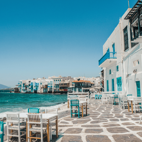 Explore the whitewashed streets of Mykonos Town, just 6 kilometres away